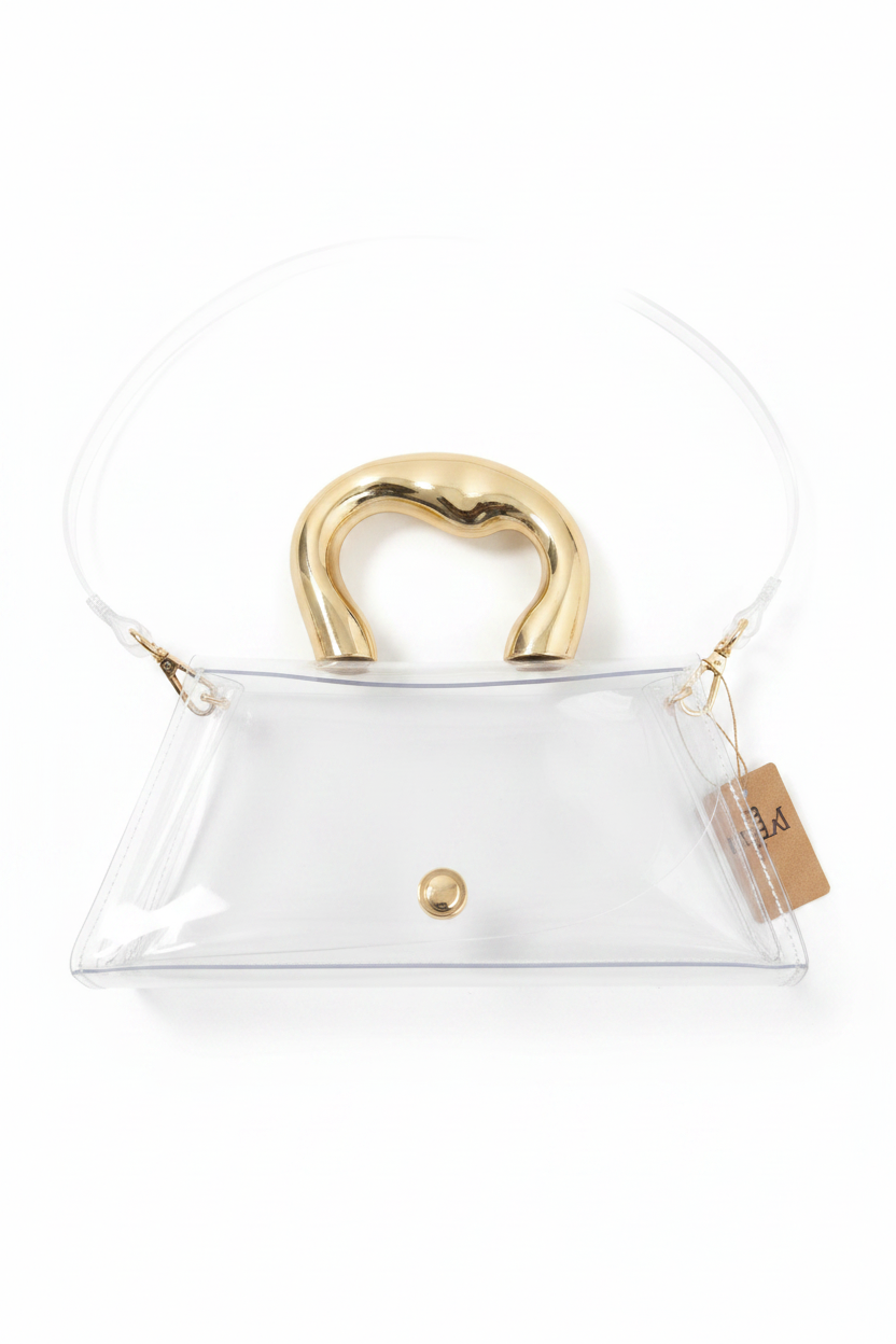 Bolsa transparente asa dorada escultural vista superior fondo blanco